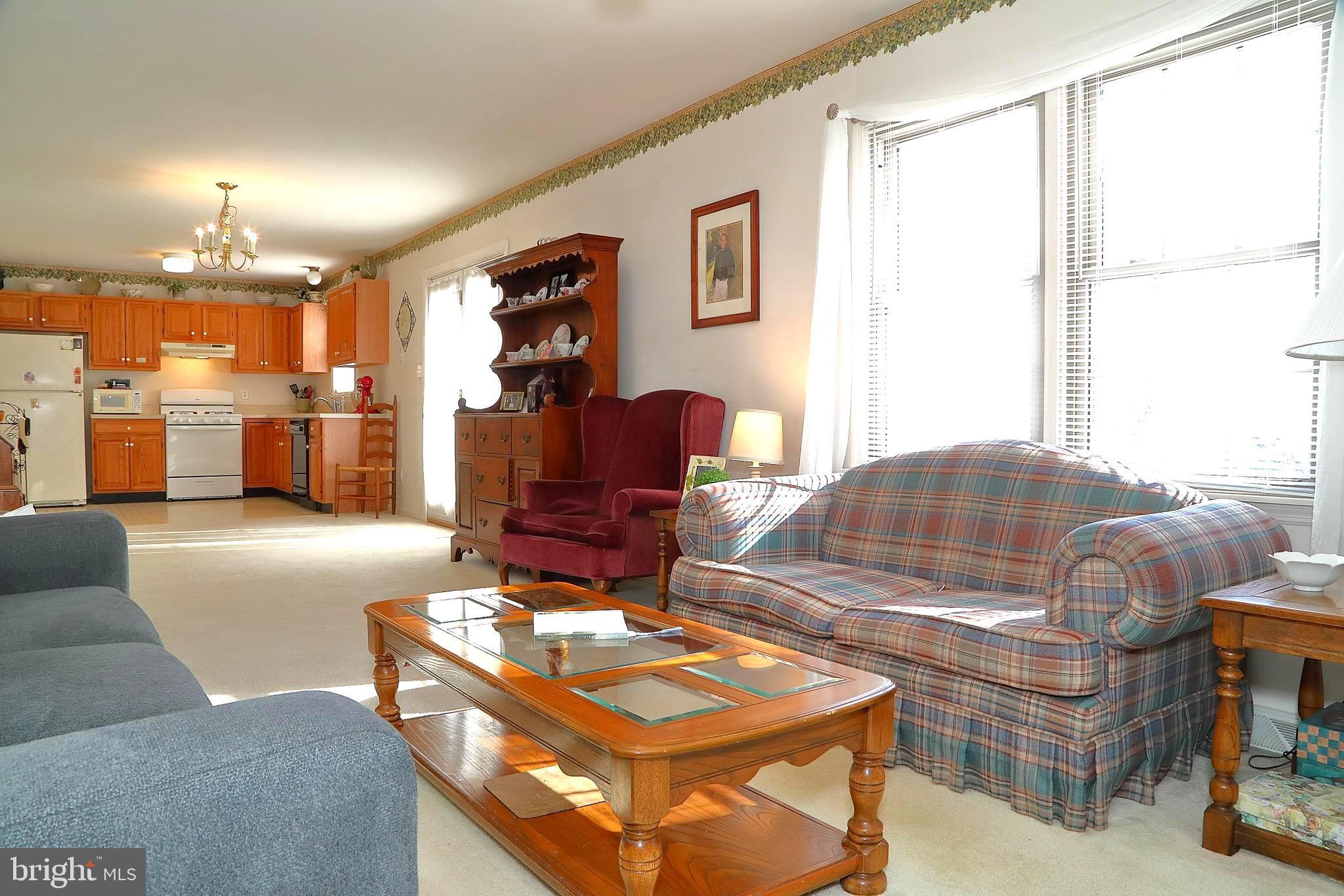 11 Duffield Drive Lititz, PA 17543 - Photo 8 of 22 a living room with furniture and a fireplace