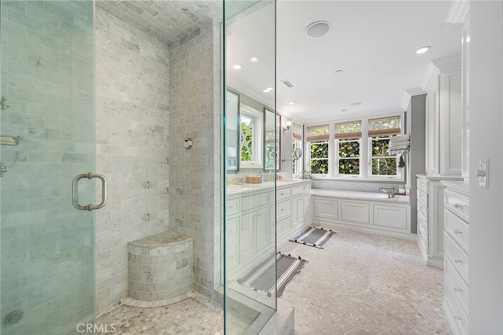 324 Emerald Bay Laguna Beach, CA 92651 - Photo 14 of 47 a bathroom with a tub shower and sink