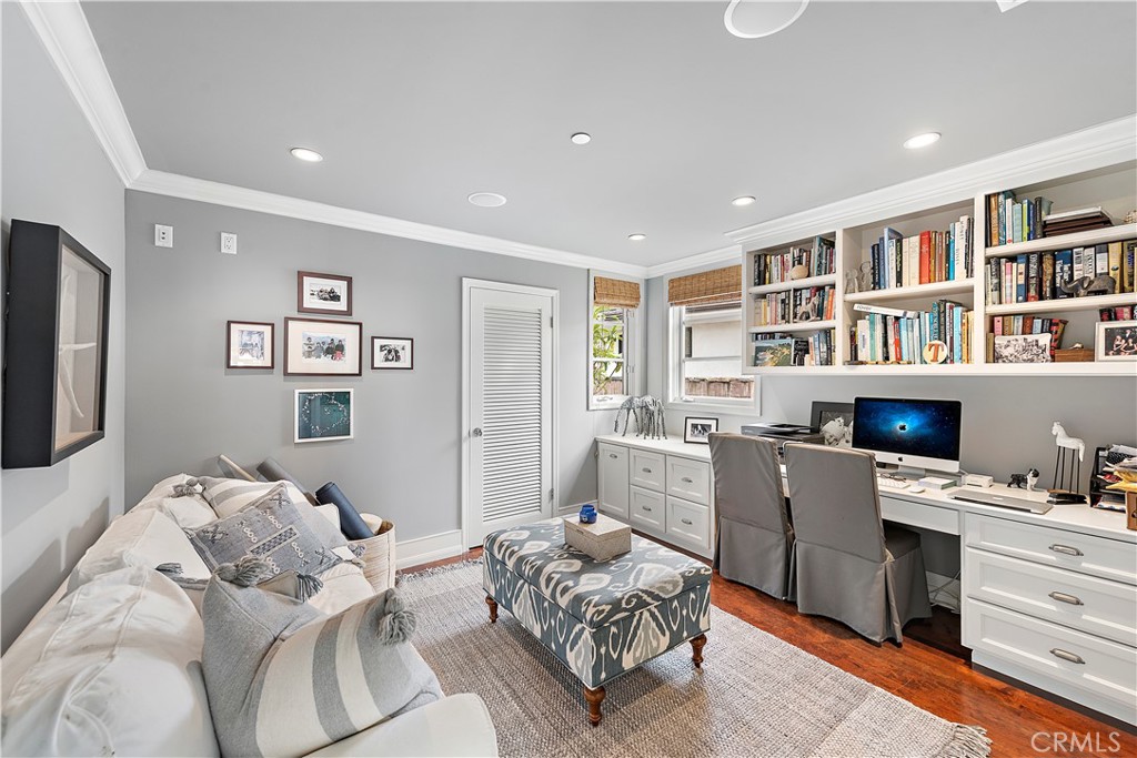 324 Emerald Bay Laguna Beach, CA 92651 - Photo 19 of 47 a bedroom with furniture and a book shelf