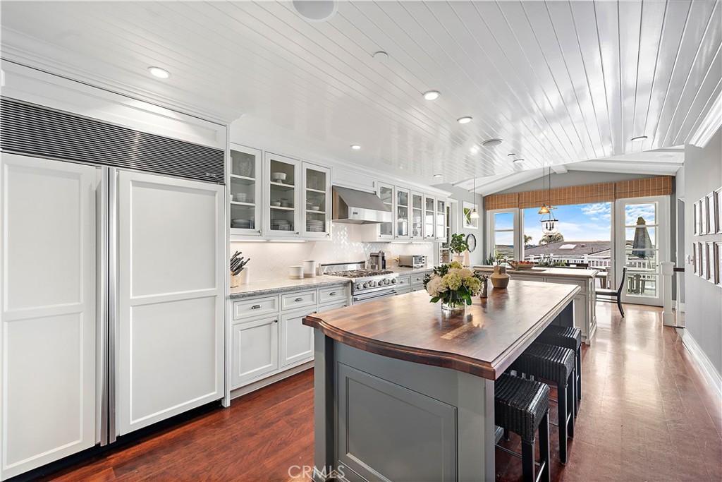 324 Emerald Bay Laguna Beach, CA 92651 - Photo 28 of 47 a kitchen with a sink stainless steel appliances and cabinets
