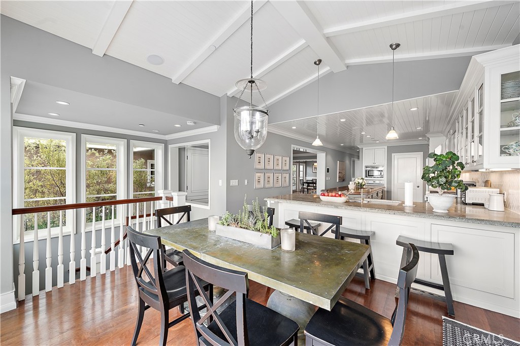 324 Emerald Bay Laguna Beach, CA 92651 - Photo 33 of 47 a view of a dining room with furniture window and wooden floor