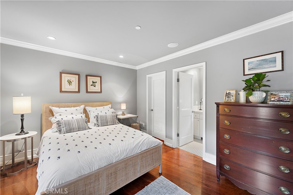324 Emerald Bay Laguna Beach, CA 92651 - Photo 37 of 47 a bedroom with a bed and a dresser