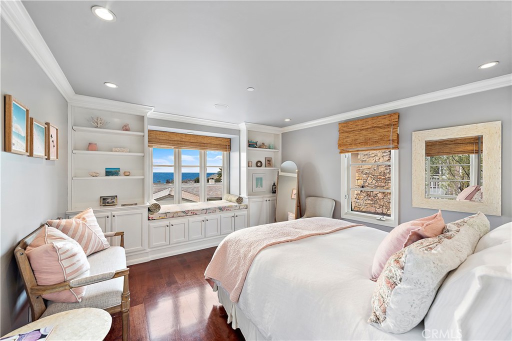 324 Emerald Bay Laguna Beach, CA 92651 - Photo 41 of 47 a large bedroom with a large bed and a large window
