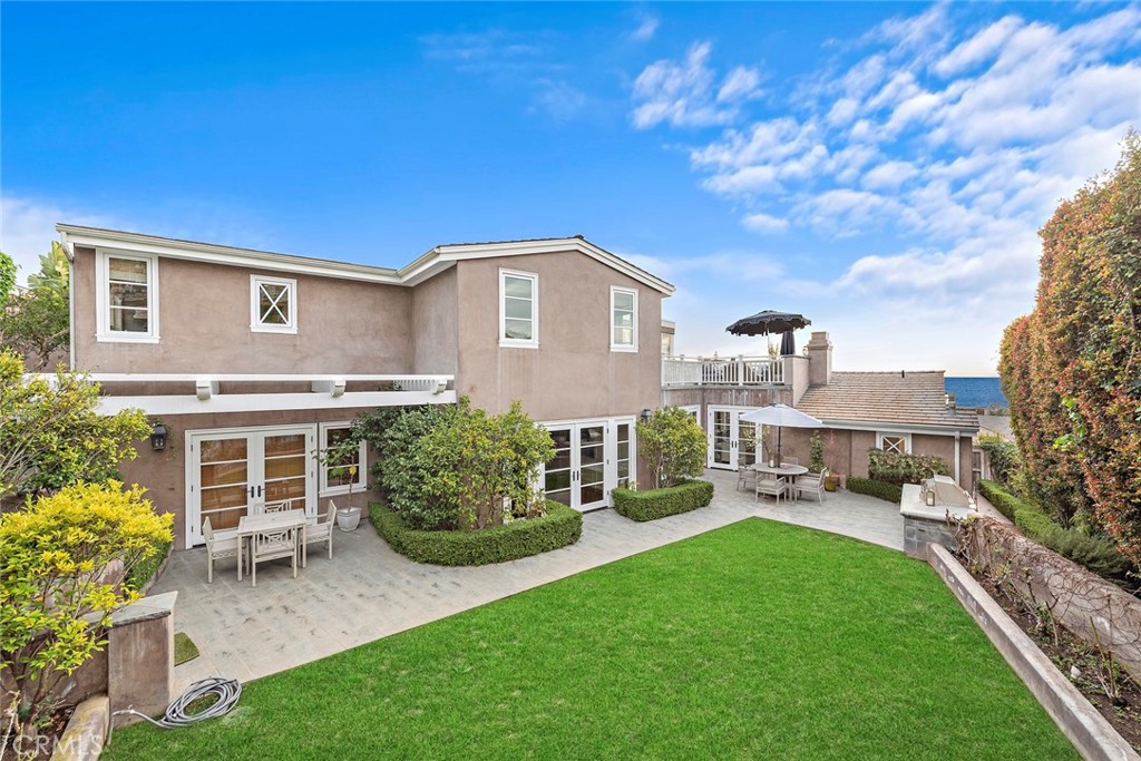324 Emerald Bay Laguna Beach, CA 92651 - Photo 45 of 47 a front view of a house with a garden