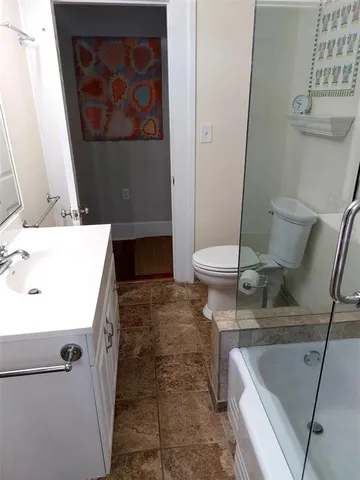 a bathroom with a sink and a toilet