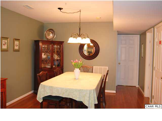 1030 Amber Ridge Road Charlottesville, VA 22901 - Photo 8 of 22 a kitchen with a table and chairs