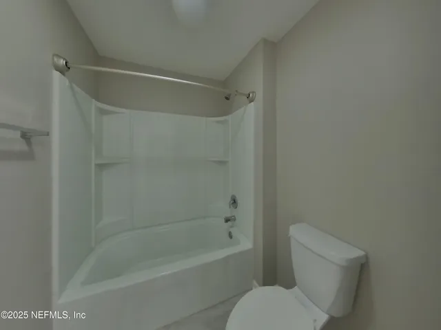 a view of backyard of house