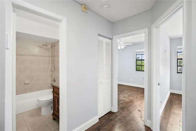 a bathroom with a shower and a toilet