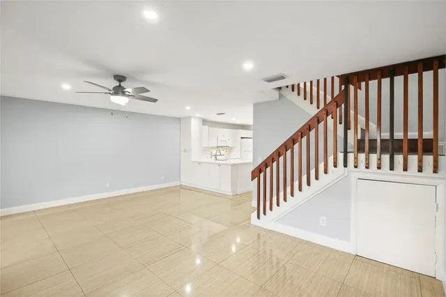 an entryway in a hall with a window