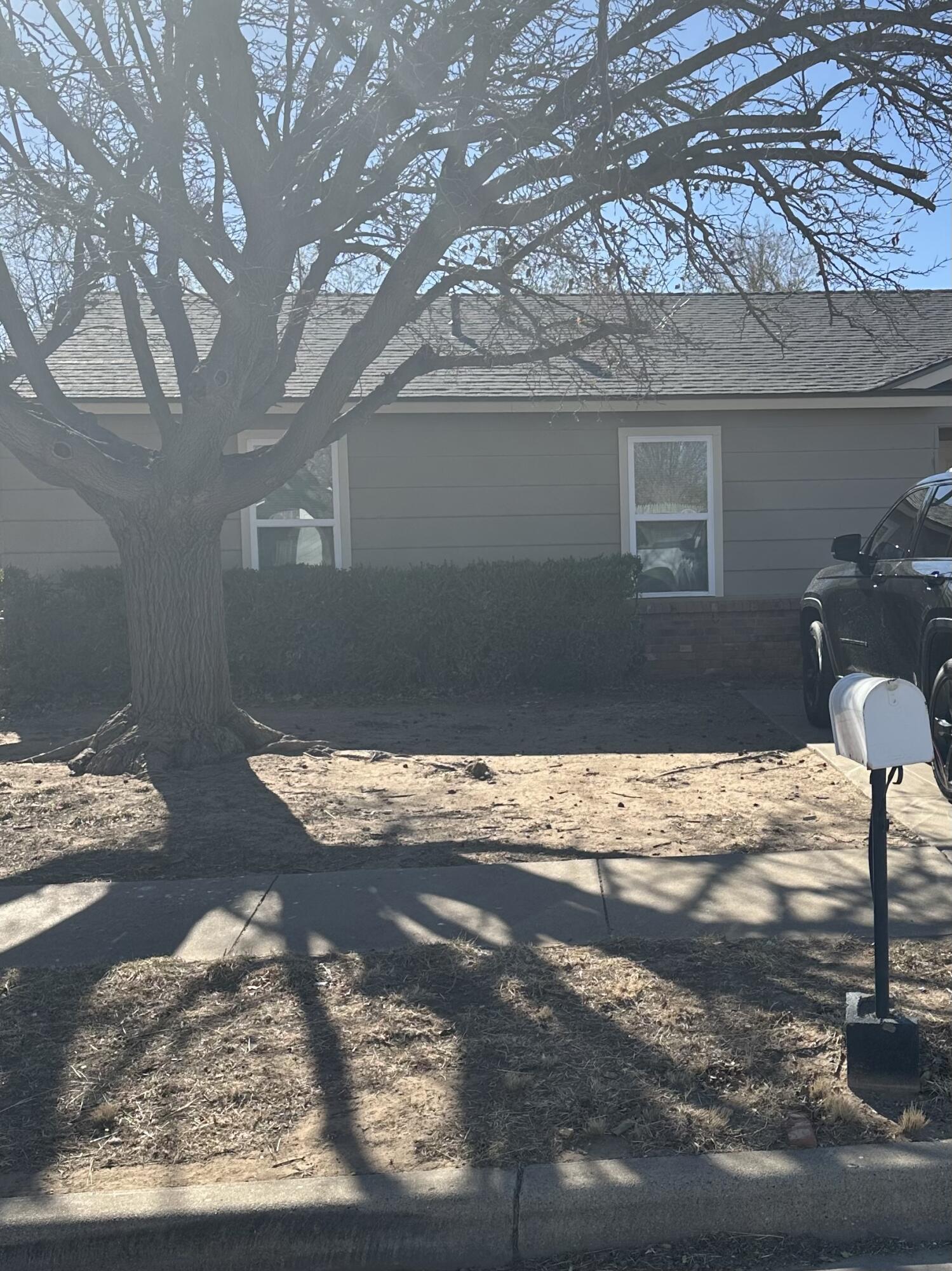 a view of a backyard of the house