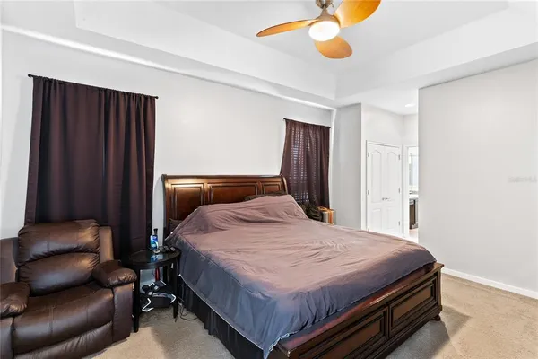 a bedroom with a bed and dresser