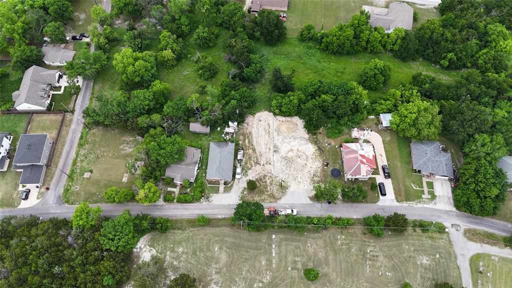 Tbd East Fulton Street Van Alstyne, TX 75495 - Photo 7 of 12 a view of a house with a yard and potted plants