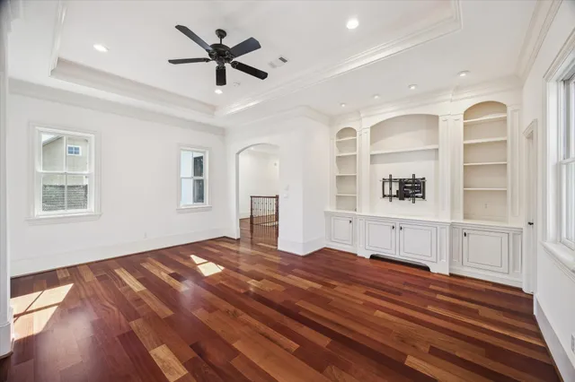 a bedroom with furniture and window