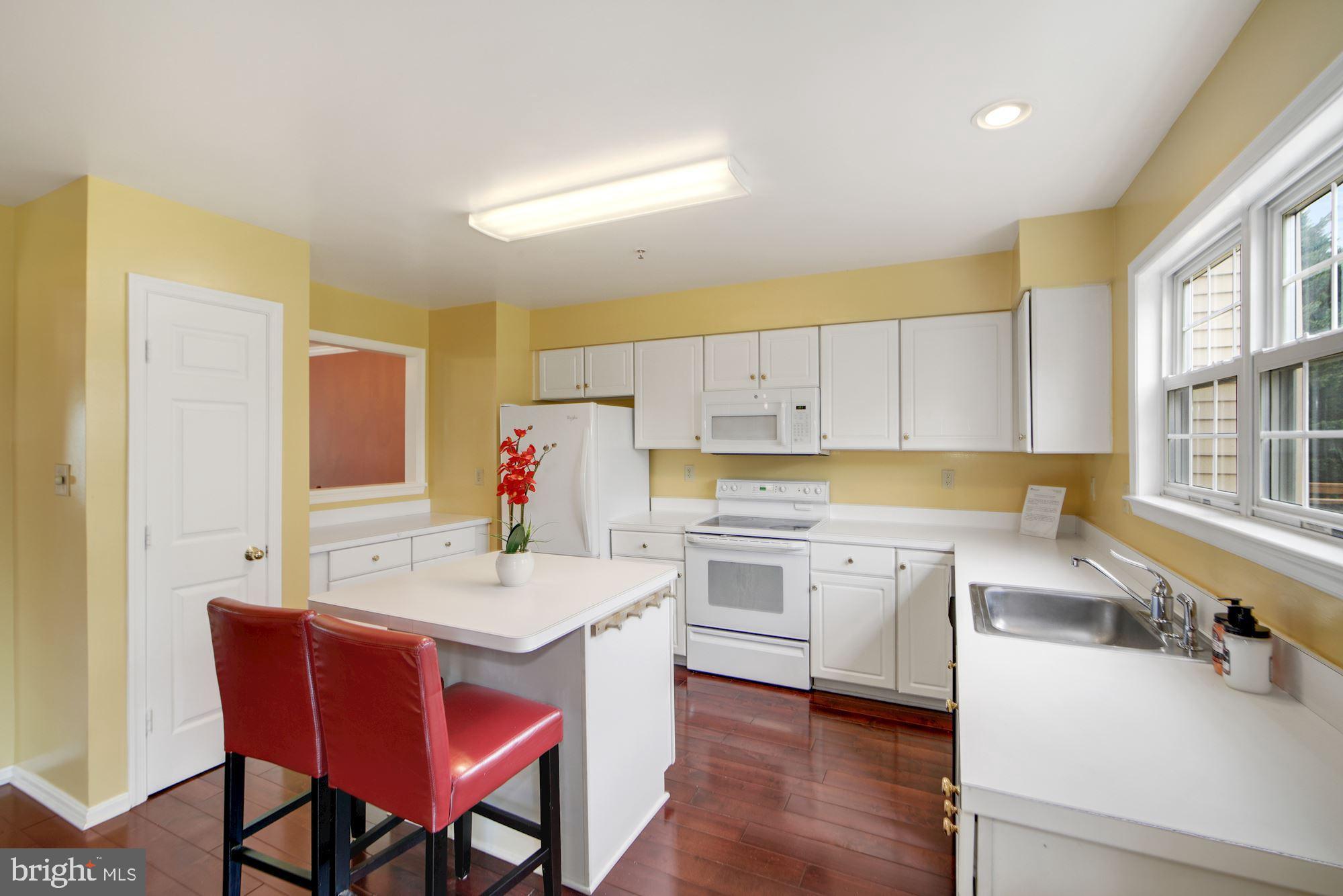 14211 Plum Run Way Silver Spring, MD 20906 - Photo 6 of 33 Kitchen w/Island Table