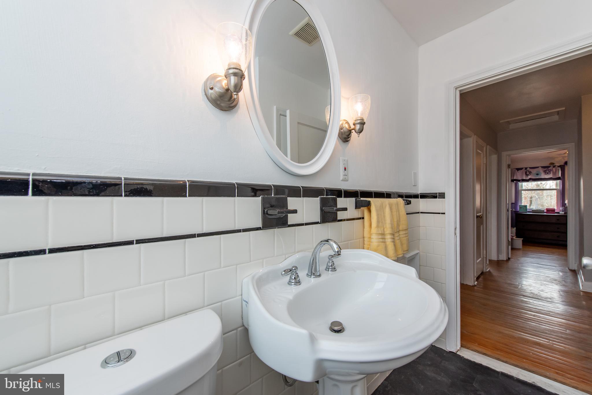 626 Braeside Road Baltimore, MD 21229 - Photo 22 of 34 Bath w/pedestal sink