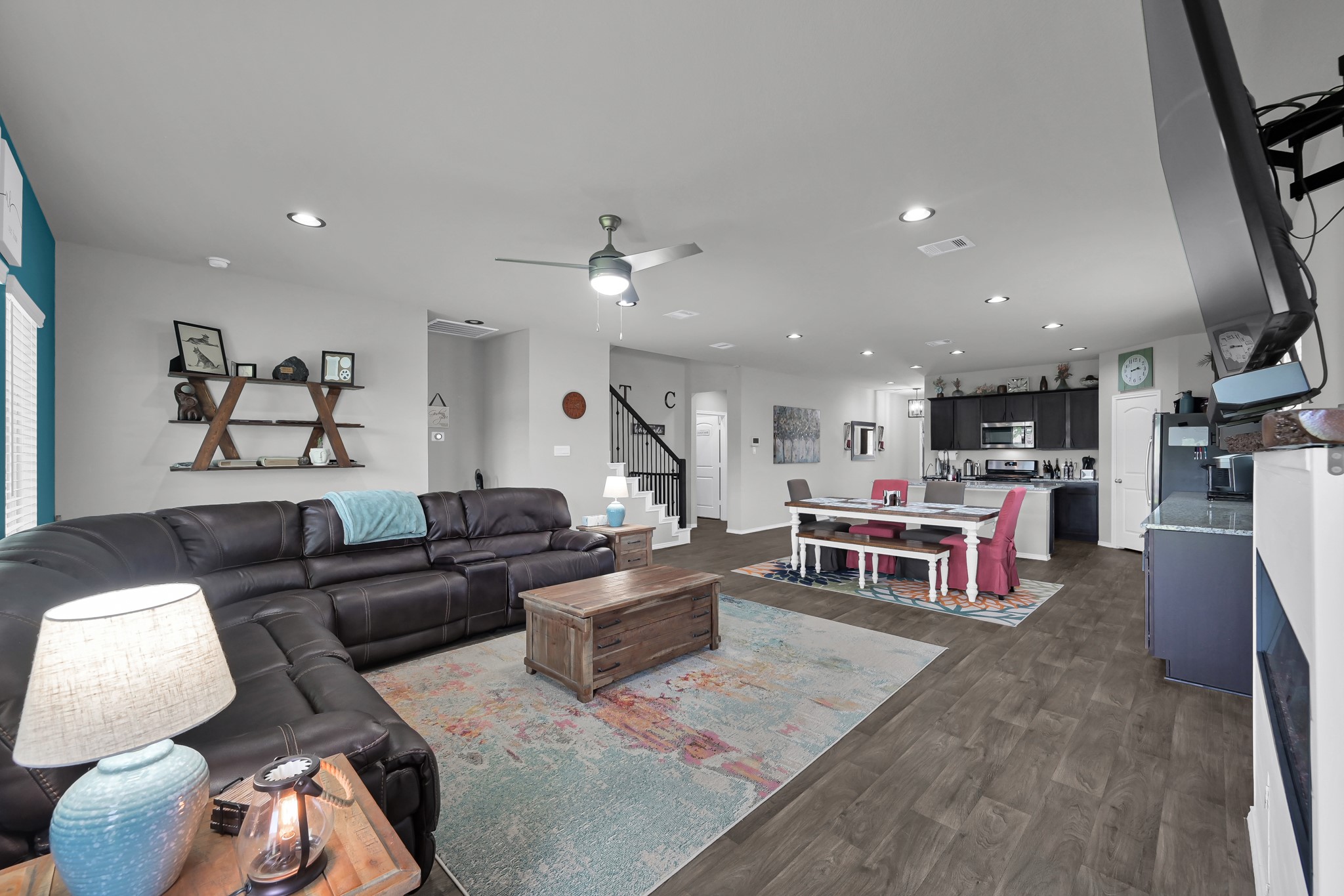6302 Hendricks Harbor Conroe, TX 77304 - Photo 11 of 24 a living room with furniture and kitchen view