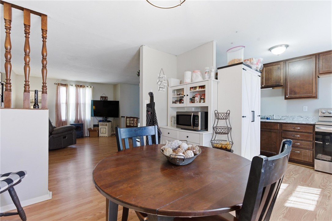 707 West Martindale Road Union, OH 45322 - Photo 6 of 28 This bright and airy kitchen and dining area features sleek countertops and ample cabinetry.