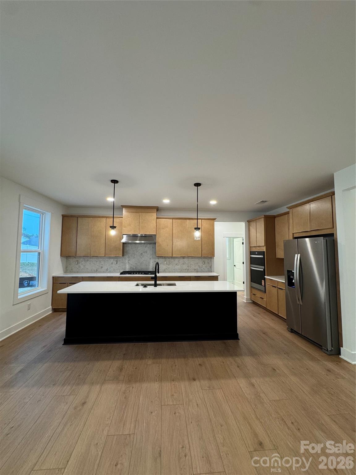 3024 Griffs Pond Road, Unit 388 Charlotte, NC 28269 - Photo 4 of 12 a spacious bathroom with a bathtub and shower