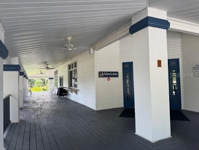 a view of a livingroom with furniture and hardwood floor
