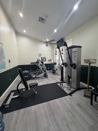 a view of a park with large trees