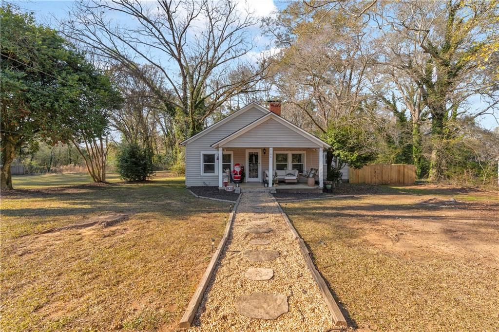 4106 Highway 29 Colbert, GA 30628 - Photo 18 of 82 a front view of a house with a yard