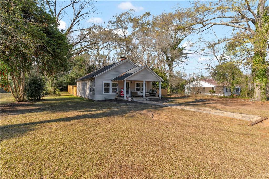 4106 Highway 29 Colbert, GA 30628 - Photo 19 of 82 a front view of a house with a yard