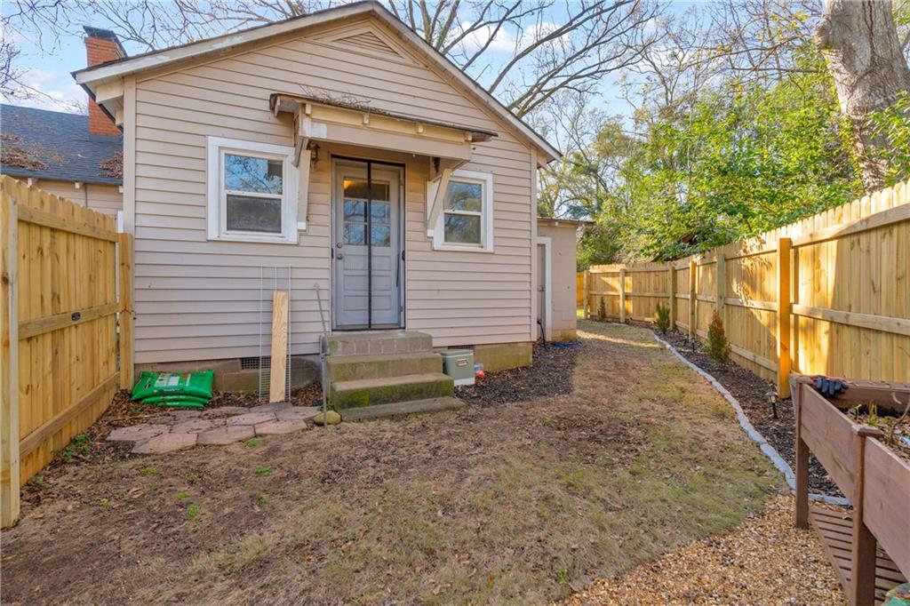 4106 Highway 29 Colbert, GA 30628 - Photo 25 of 82 a view of a house with a yard and wooden fence