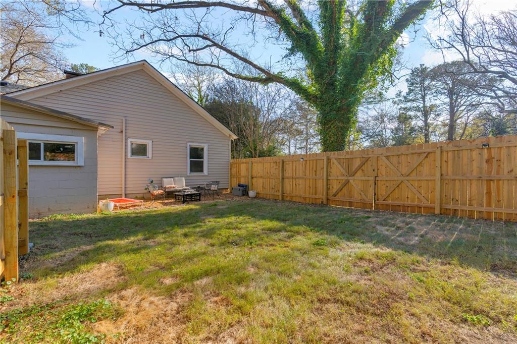 4106 Highway 29 Colbert, GA 30628 - Photo 36 of 82 a backyard of a house with table and chairs