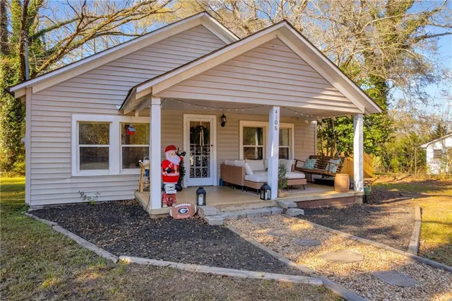 a view of a hallway with paintings on the wall