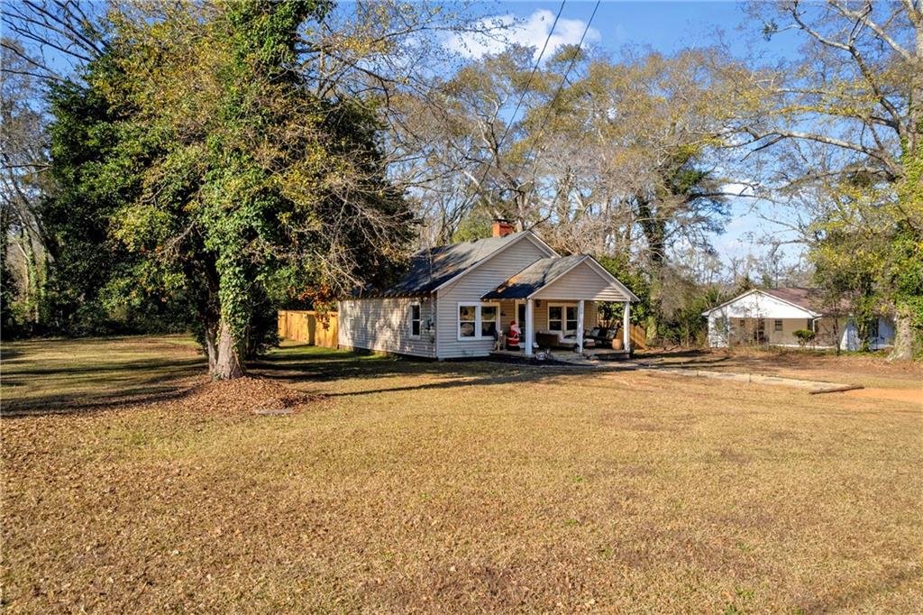 4106 Highway 29 Colbert, GA 30628 - Photo 46 of 82 a front view of a house with a yard