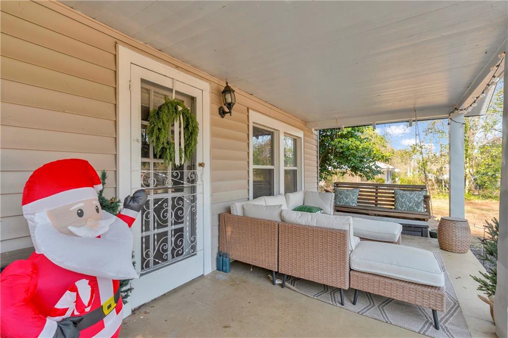 4106 Highway 29 Colbert, GA 30628 - Photo 54 of 82 a bedroom with furniture and a large window