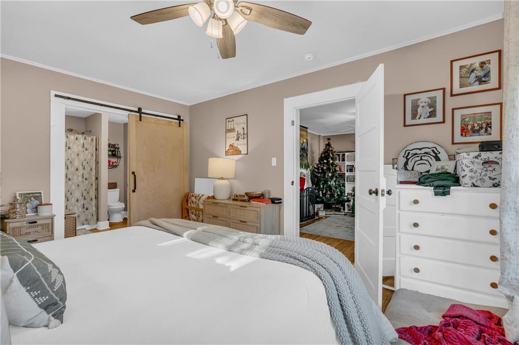 4106 Highway 29 Colbert, GA 30628 - Photo 61 of 82 a bedroom with a bed and a dresser