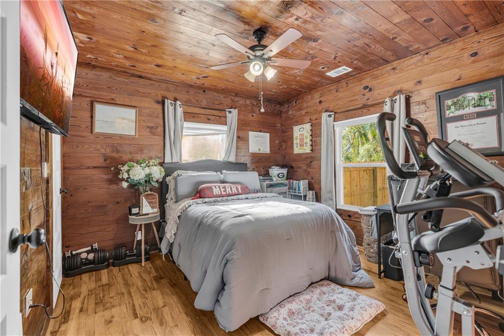 4106 Highway 29 Colbert, GA 30628 - Photo 71 of 82 a bedroom with a bed and a flat screen tv