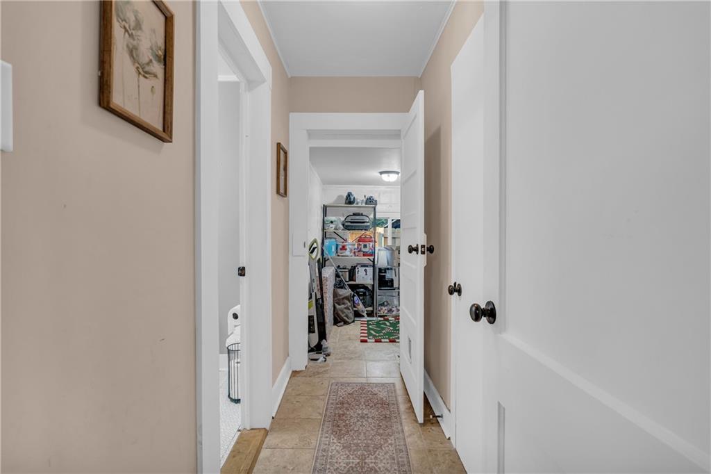 4106 Highway 29 Colbert, GA 30628 - Photo 73 of 82 a view of a hallway with paintings on the wall
