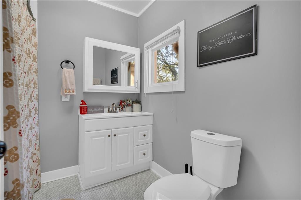4106 Highway 29 Colbert, GA 30628 - Photo 78 of 82 a bathroom with a toilet sink and mirror