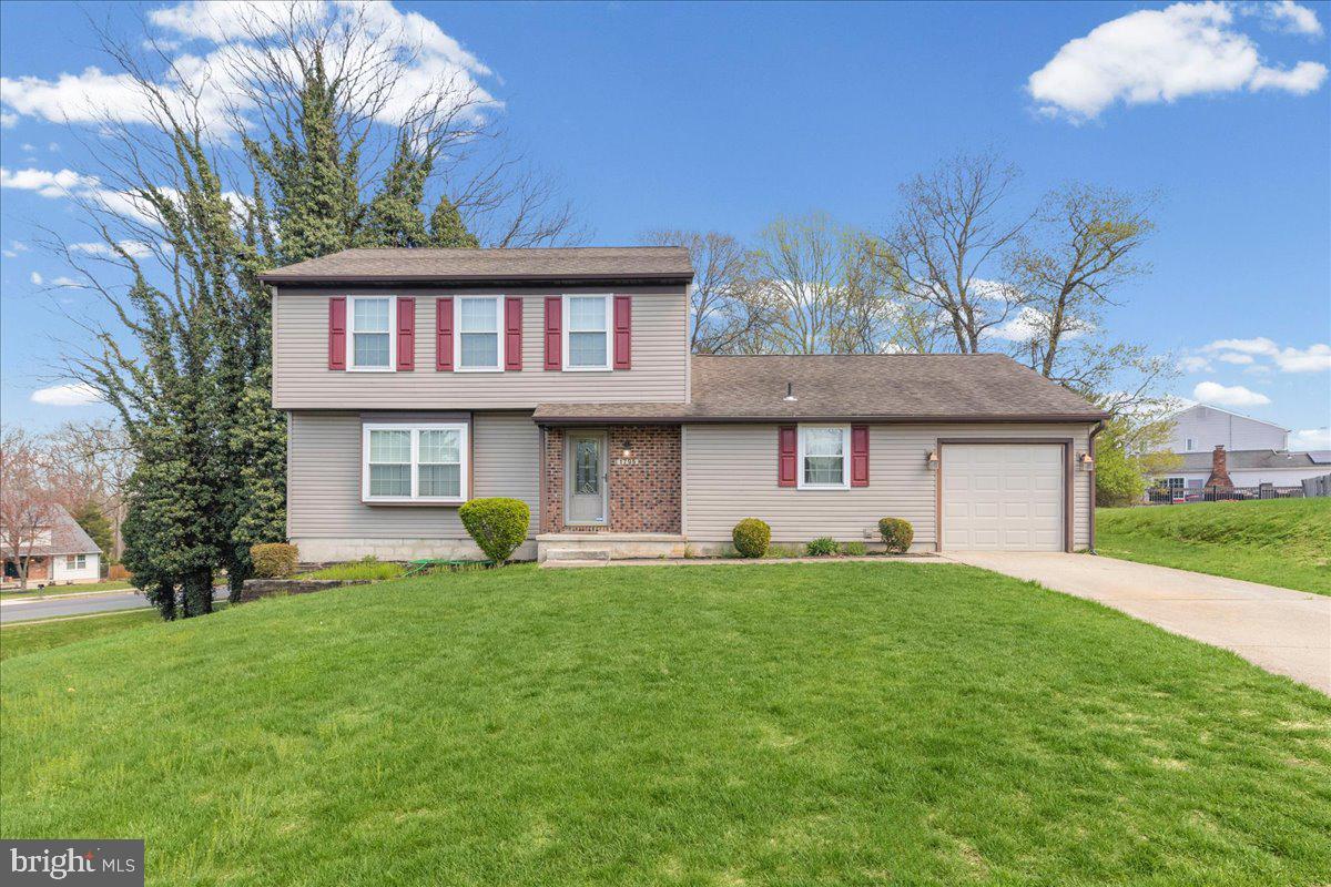 1795 Witherspoon Court Sewell, NJ 08080 - Photo 1 of 32 a front view of a house with a yard and trees