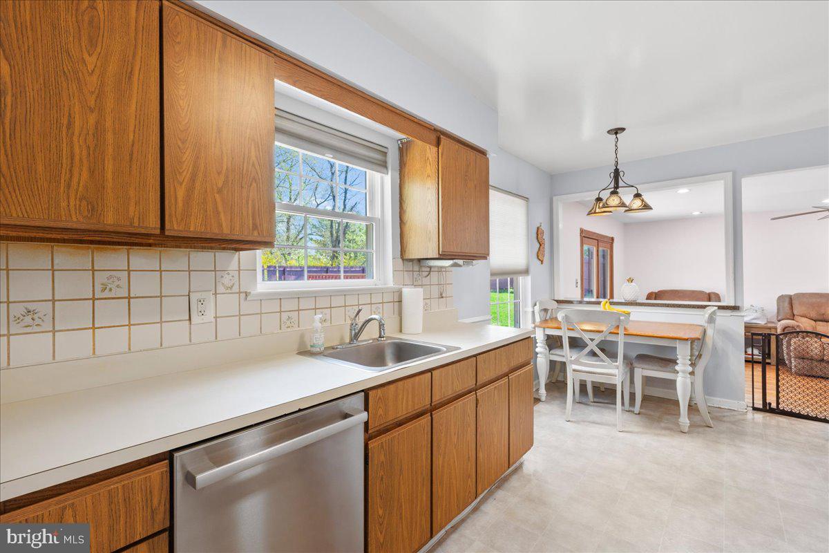 1795 Witherspoon Court Sewell, NJ 08080 - Photo 11 of 32 a kitchen with a sink cabinets and window