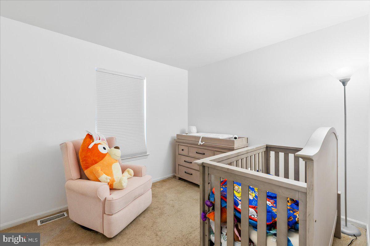 1795 Witherspoon Court Sewell, NJ 08080 - Photo 16 of 32 a bedroom with furniture and a couch