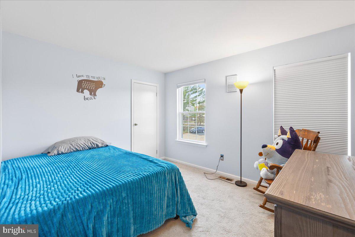 1795 Witherspoon Court Sewell, NJ 08080 - Photo 18 of 32 a bedroom with a bed and a window