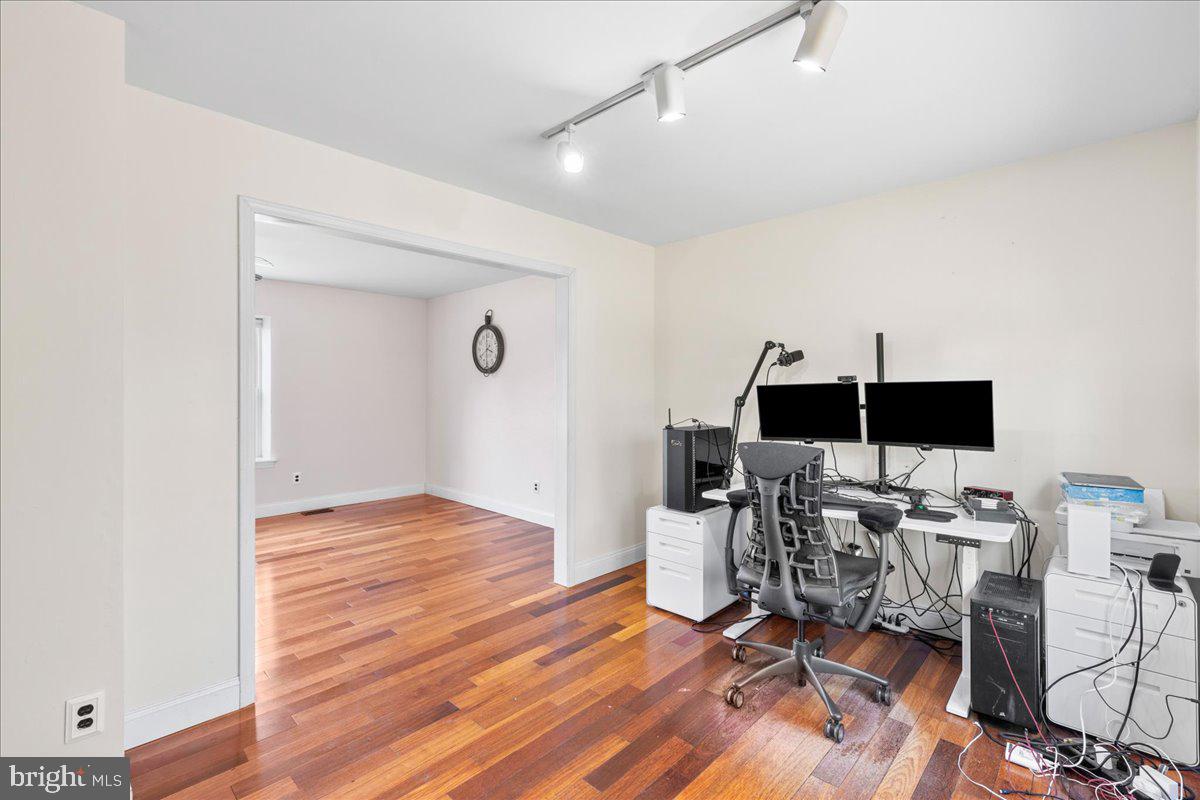 1795 Witherspoon Court Sewell, NJ 08080 - Photo 8 of 32 a view of a workspace with wooden floor