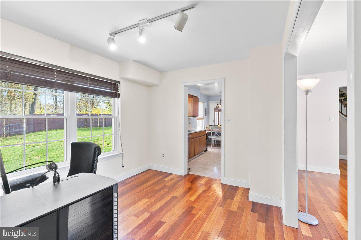 1795 Witherspoon Court Sewell, NJ 08080 - Photo 9 of 32 a room with a bed and large windows