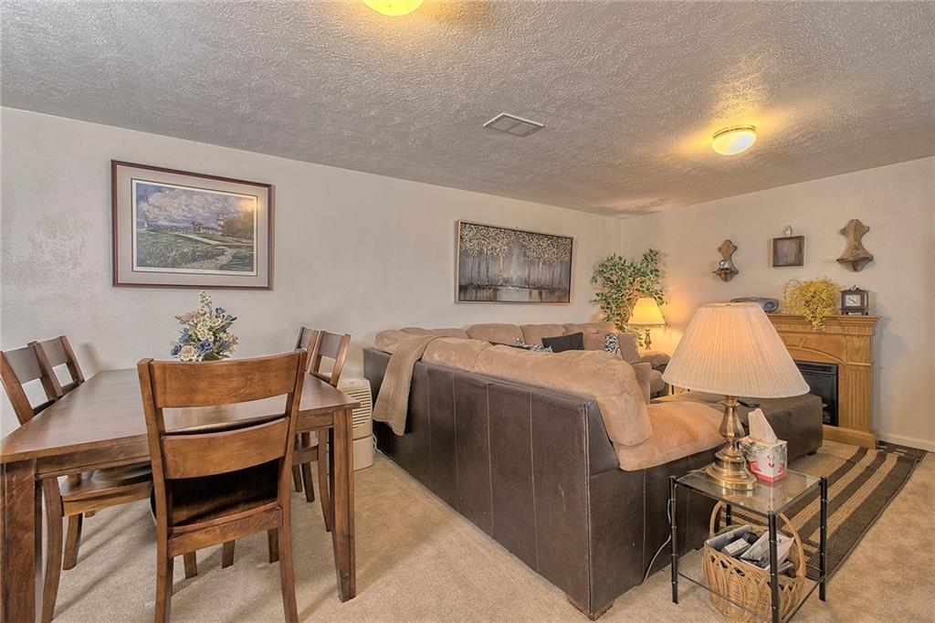 545 Greenridge Road New Kensington, PA 15068 - Photo 12 of 28 a bedroom with a bed and a table in it