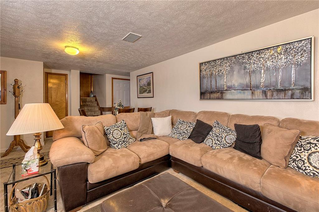 545 Greenridge Road New Kensington, PA 15068 - Photo 14 of 28 a living room with furniture and a couch
