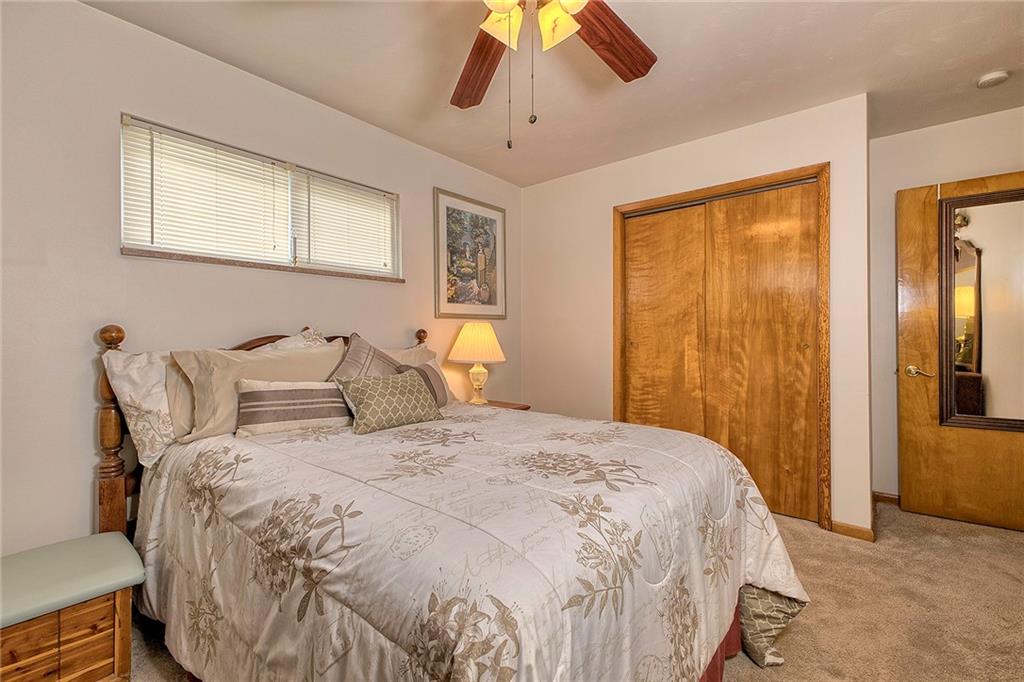 545 Greenridge Road New Kensington, PA 15068 - Photo 19 of 28 a bedroom with a bed and wooden floor