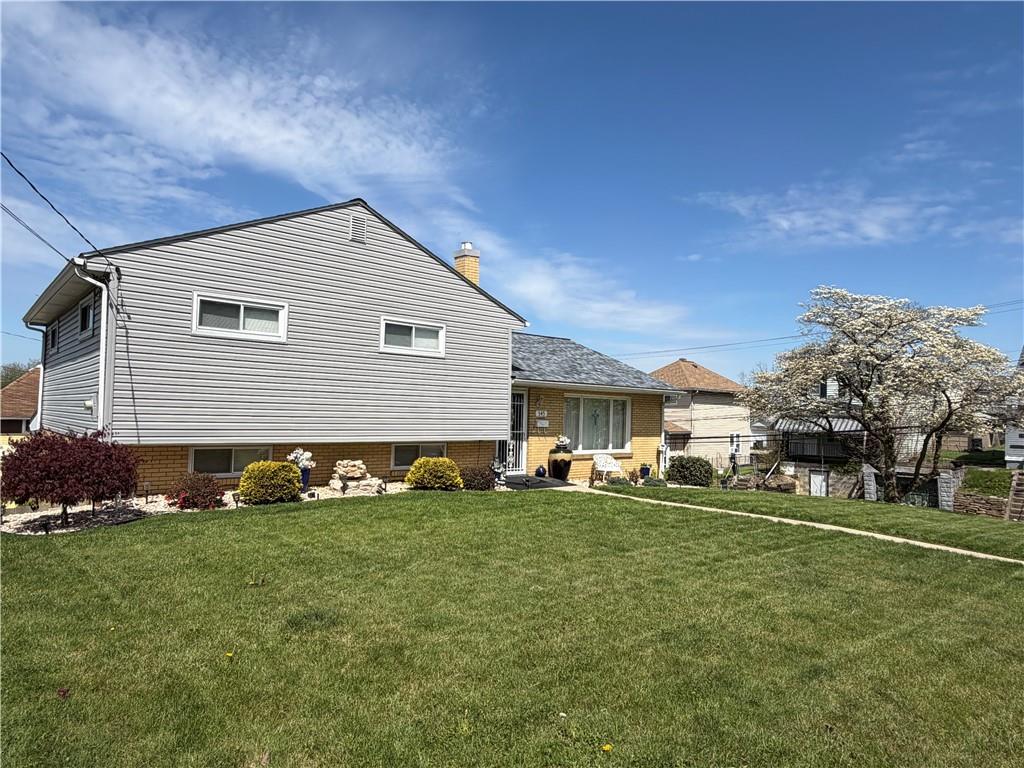 545 Greenridge Road New Kensington, PA 15068 - Photo 25 of 28 a front view of a house with a yard