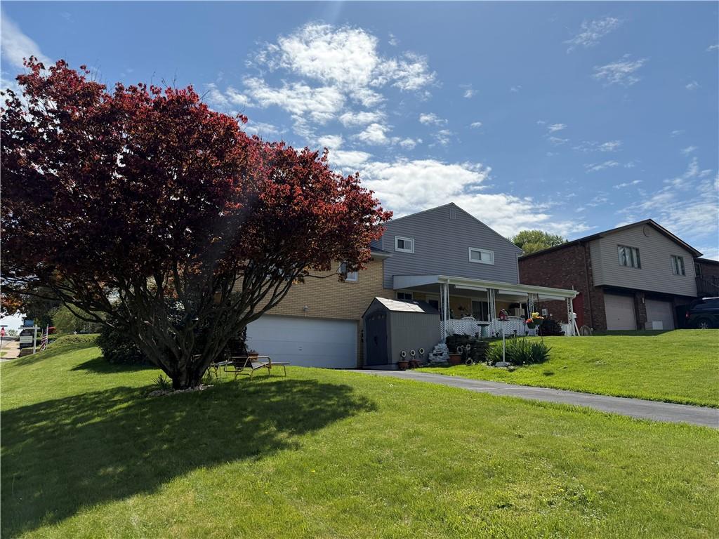 545 Greenridge Road New Kensington, PA 15068 - Photo 27 of 28 a front view of house with yard and green space