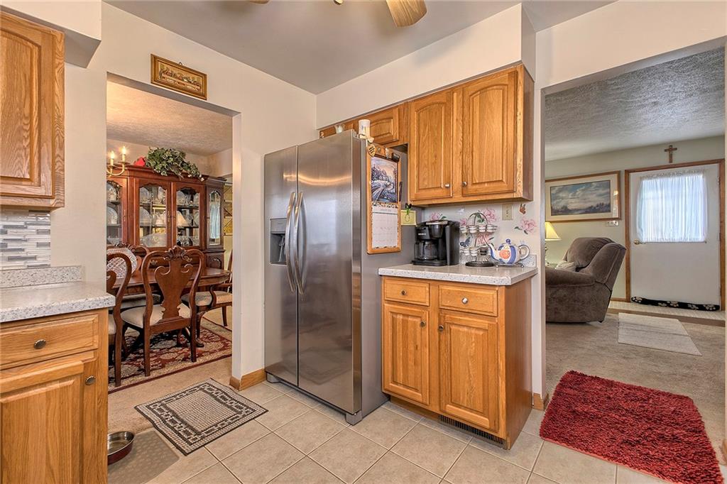 545 Greenridge Road New Kensington, PA 15068 - Photo 6 of 28 a kitchen with stainless steel appliances granite countertop a refrigerator and a sink
