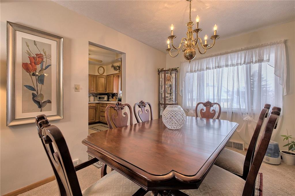 545 Greenridge Road New Kensington, PA 15068 - Photo 10 of 28 a view of a dining room with furniture window and wooden floor