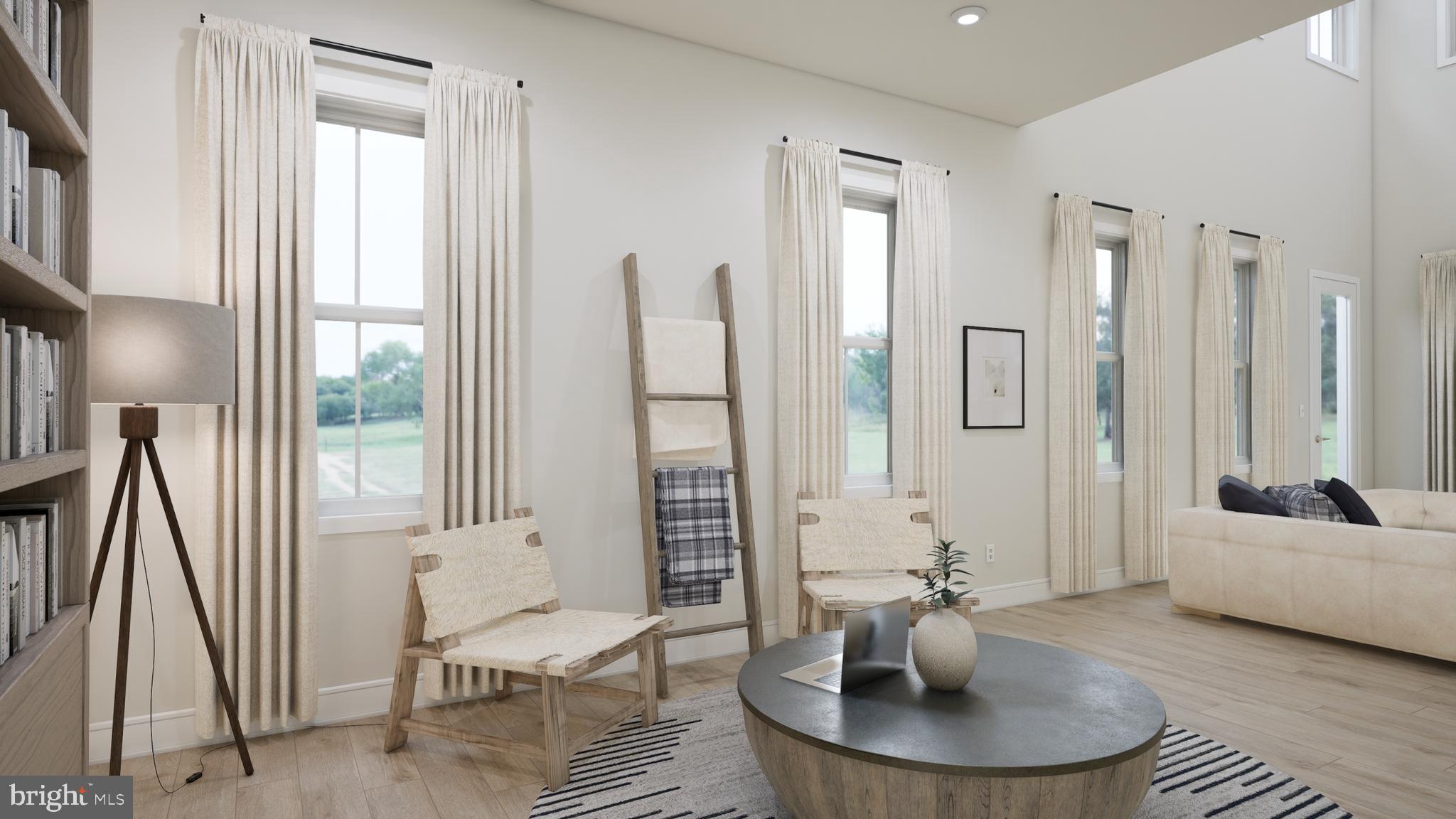 25611 Red Cherry Drive Aldie, VA 20105 - Photo 9 of 26 a living room with furniture and a large window