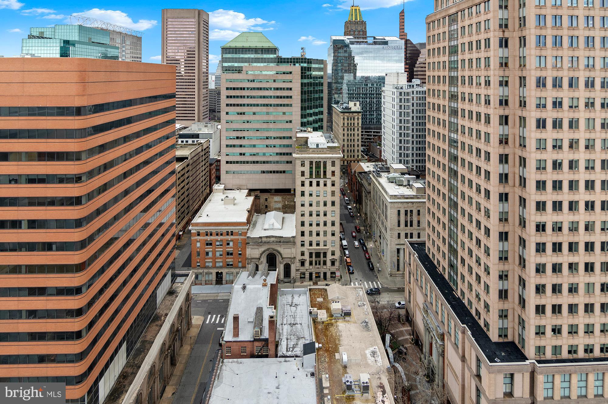 414 Water Street, Unit 2504 Baltimore, MD 21202 - Photo 15 of 20 a city view with tall buildings